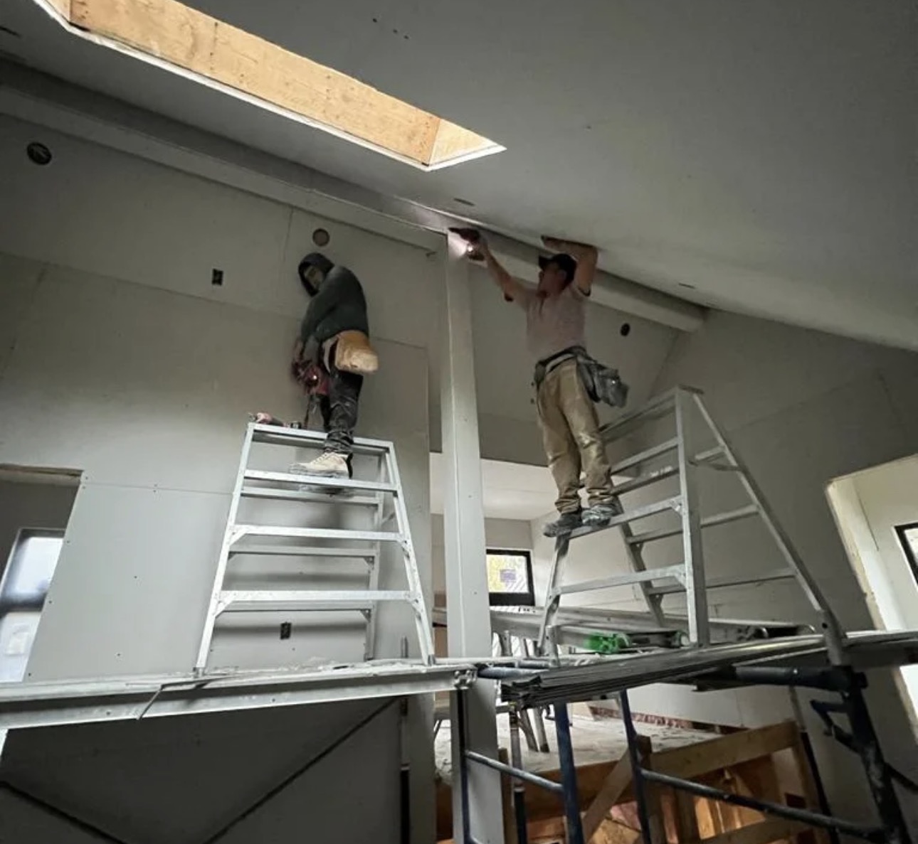North York Drywall Painting crew at a finished job site
