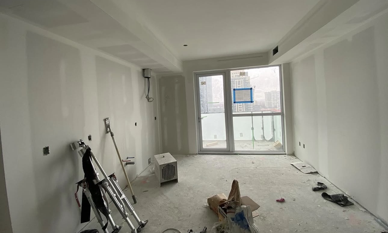 Before and after drywall repair and interior painting in a North York home