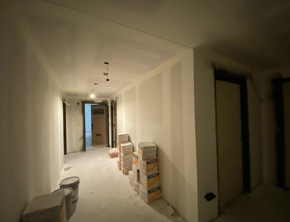 North York living room interior painting on paint-ready Level 5 drywall finish